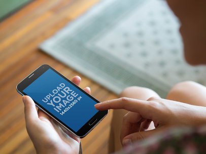 Mockup Template of Woman Using Samsung Galaxy at the Living Room