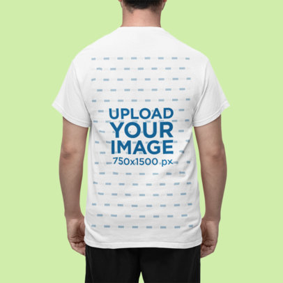 Back-View Gildan Tee Mockup Featuring a Man Standing in a Studio
