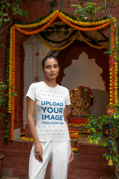 Gildan T-Shirt Mockup of a Woman Posing Against Diwali Decorations