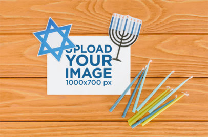 Mockup of a Flyer Placed on a Wooden Background With Hanukkah Decorations m35178 r-el2