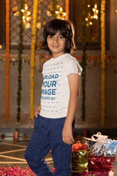 Heathered T-Shirt Mockup of a Smiling Boy Celebrating Diwali at Night