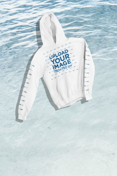 Mockup of a Pullover Hoodie Falling in a Customizable Background m35260