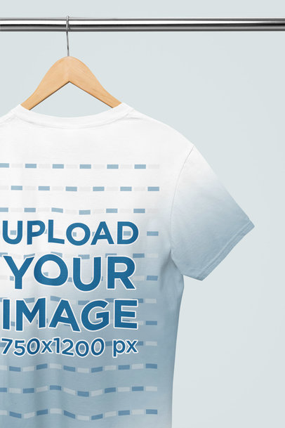 Mockup of a Round-Neck Gildan Degraded T-Shirt Placed on a Wooden Hanger