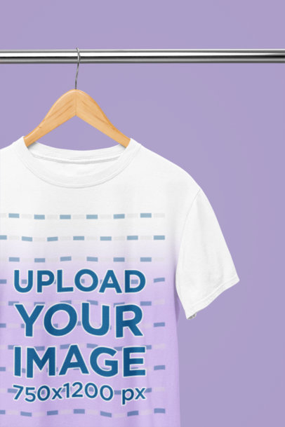 Mockup of a Rounded-Neck Gildan T-Shirt Placed on a Wooden Hanger