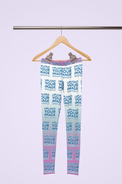 Mockup of a Degraded Pair of Leggings Placed on a Hanger m36368