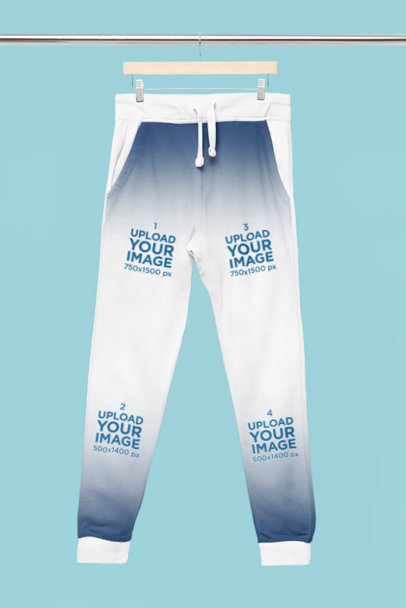 Mockup of a Degraded Pair of Sweatpants Placed on a Hanger m36371