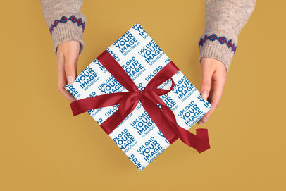 Wrapping Paper Mockup Featuring a Woman Holding a Gift m35524 r-el2
