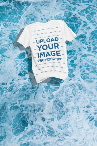 Mockup of a Bella Canvas T-Shirt Falling into a Customizable Surface m35256