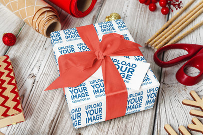 Wrapping Paper Mockup Featuring a Present and a Christmas Gift Card m35527 r-el2