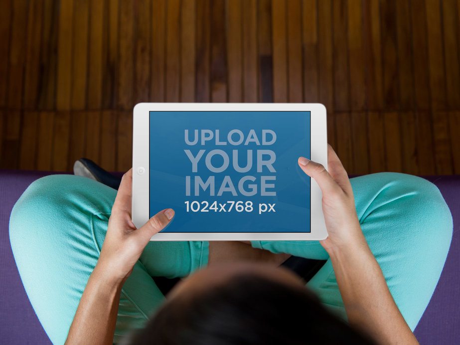 iPad Mockup Template Featuring a Young Woman Doing Yoga