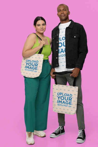 T-Shirt and Tote Bag Mockup of a Woman and a Man Posing in a Studio
