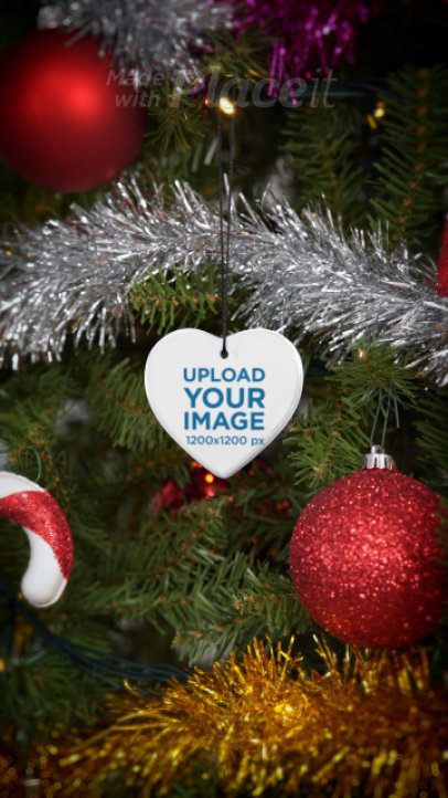 Video of a Heart-Shaped Ceramic Ornament Hanging on a Christmas Tree