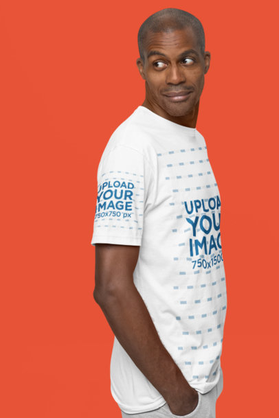 Mockup of a Man Wearing a Next Level T-Shirt with a Customizable Sleeve