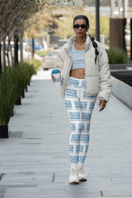 Leggings Mockup of a Woman Wearing an Athleisure Outfit and Holding a Coffee Cup