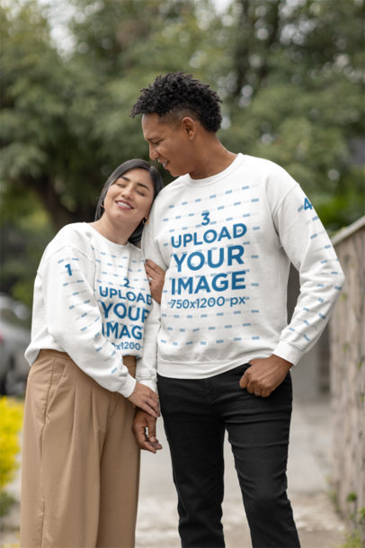 Gildan Sweatshirt Mockup Featuring a Sweet Couple Walking on a Sidewalk m36329