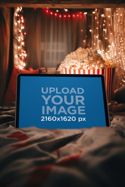 Winter-Themed Mockup of an AI-Generated iPad Placed on a Bed m36534