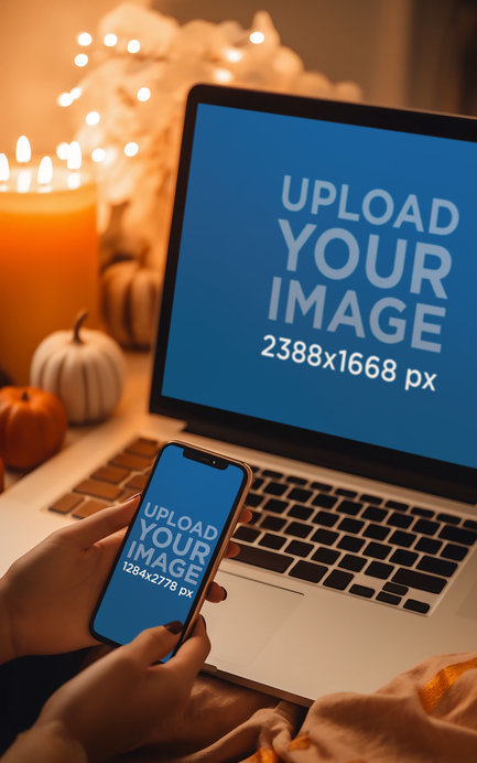 MacBook Mockup of a Woman Using Her iPhone in an Autumn-Style Environment