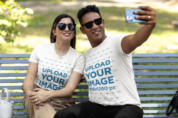 Bella Canvas T-Shirt Mockup of a Happy Couple Taking a Selfie in a Park