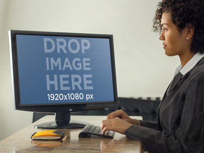 Businesswoman Types on Desktop PC Mockup Template