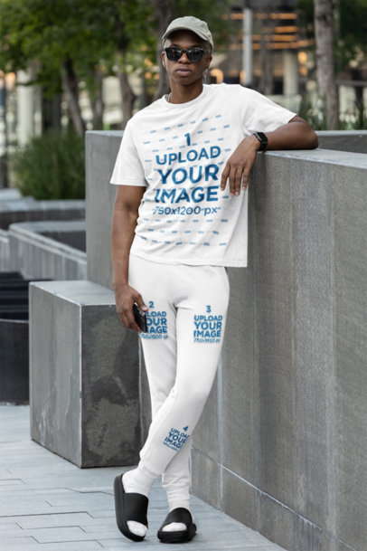 Cotton Heritage Sweatpants Mockup of a Serious Man Posing on the Street With T-Shirt
