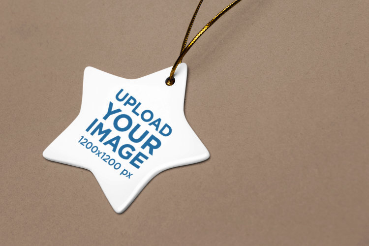 Mockup of a Ceramic Christmas Star-Shaped Ornament Lying on a Colorful Surface