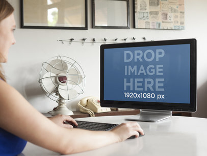 Young Woman Working With PC Desktop at Design Studio