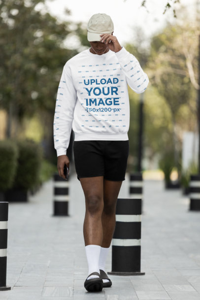 Athleisure Mockup Featuring a Man Wearing a Sweatshirt on the Street