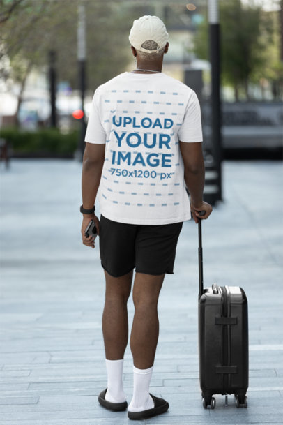 Back-View Stanley Stella T-Shirt Mockup of a Man With a Suitcase