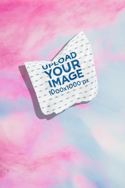 Mockup of a Sublimated Bandana Floating over a Customizable Surface m35266