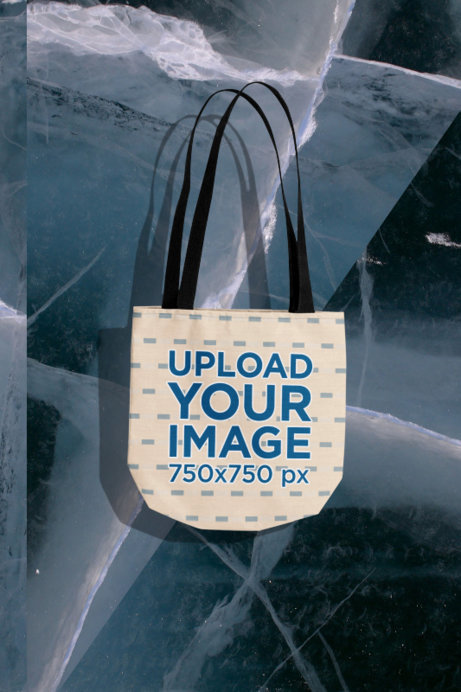 Mockup Featuring a Sublimated Tote Bag Floating over a Customizable Surface