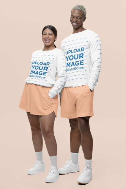 Bella Canvas Long-Sleeve Tee Mockup of a Happy Woman and a Man Posing in a Studio