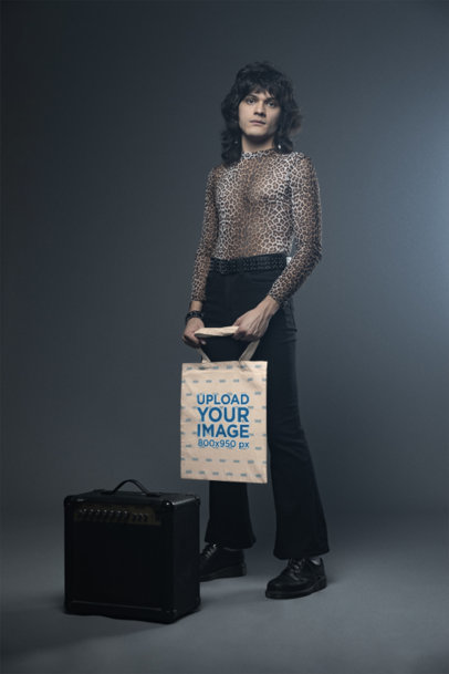 Glam Rock-Inspired Mockup of a Man in a Leopard Print Garment Carrying a Tote Bag