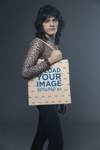 Mockup of a Rockstar Man Carrying a Sublimated Tote Bag