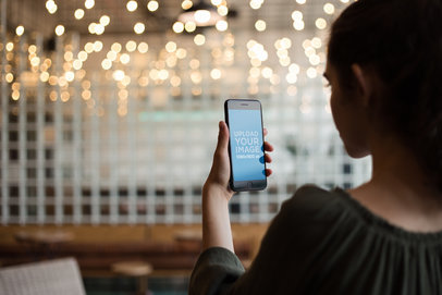 Space Gray iPhone 8 Plus Mockup of a Woman at a Cafe