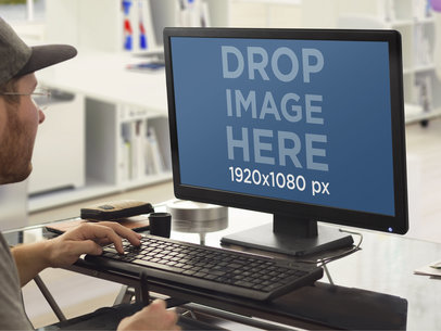 PC Mockup Template of Young Designer Working on Desktop PC at the Office