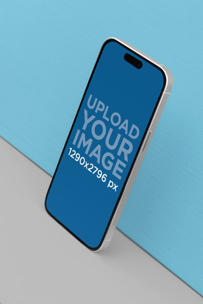 Mockup of an iPhone 15 Pro Max Placed in a Simple Setting