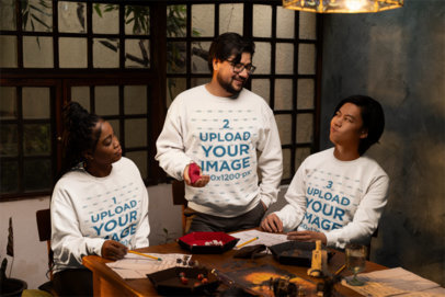 Gildan Sweatshirt Mockup of a Woman Playing RPG With Two Friends