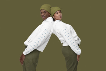 Gildan Hoodie Mockup Featuring a Man and Woman Leaning on Their Backs in a Studio