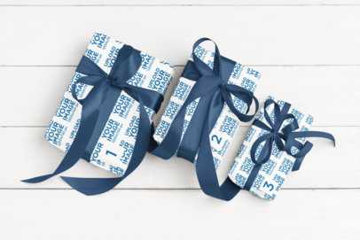 Wrapping Paper Mockup of Three Present Placed on a White Wooden Background
