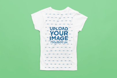 Mockup of a Gildan T-Shirt Placed Upside Down over a Solid Surface