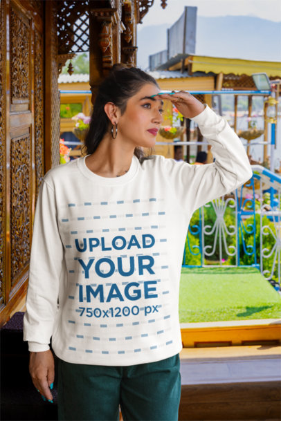 Sweatshirt Mockup of a Woman Standing on a Balcony m35578