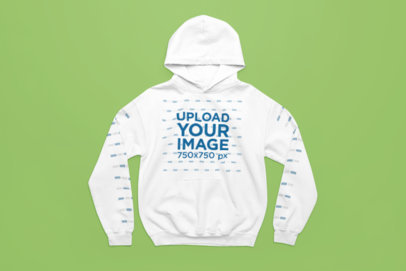 Mockup of a Gildan Pullover Hoodie Flat Laid over a Solid Surface