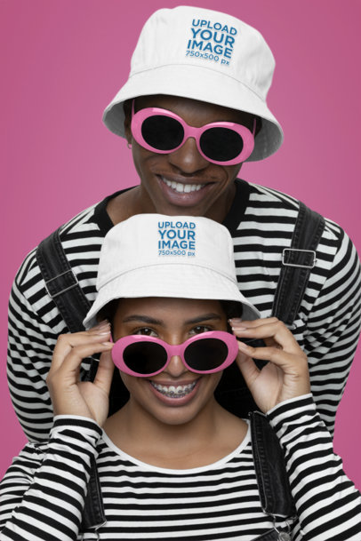 Bucket Hat Mockup of a Smiling Man and Woman Wearing Sunglasses in a Studio