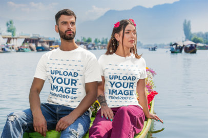 Mockup of a Couple Wearing Matching Gildan T-Shirts on a Canoe m35560
