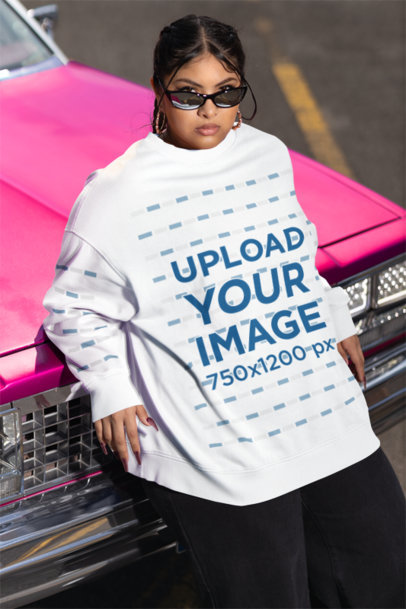 Oversized Sweatshirt Mockup of a Woman with Sunglasses Posing by a Classic Car m36817