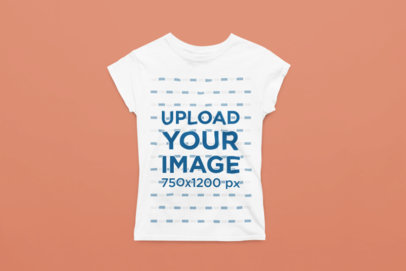 Mockup of a Gildan Rounded-Neck T-Shirt Laid over a Solid Surface