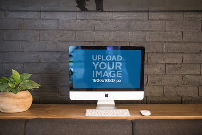 iMac Mockup Standing Against a Bricks Wall