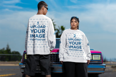 Mockup of a Man and a Woman Wearing Matching Oversized Sweatshirts