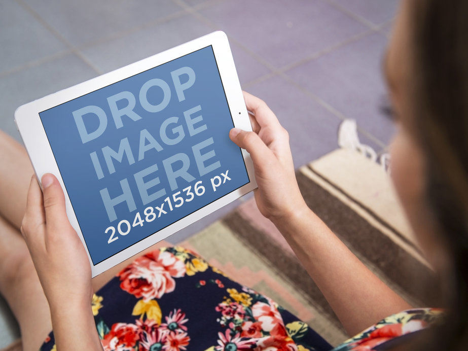 iPad Mockup Template of Woman Using White iPad on the Floor