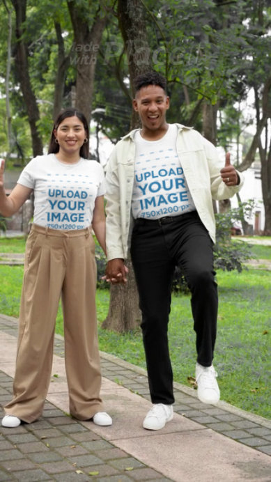 Bella Canvas T-Shirt Video of a Happy Man and Woman Holding Hands in a Park